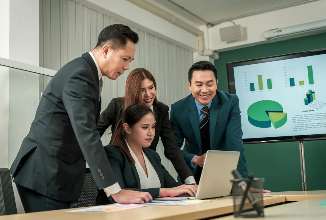 Professionals working together in a bright office